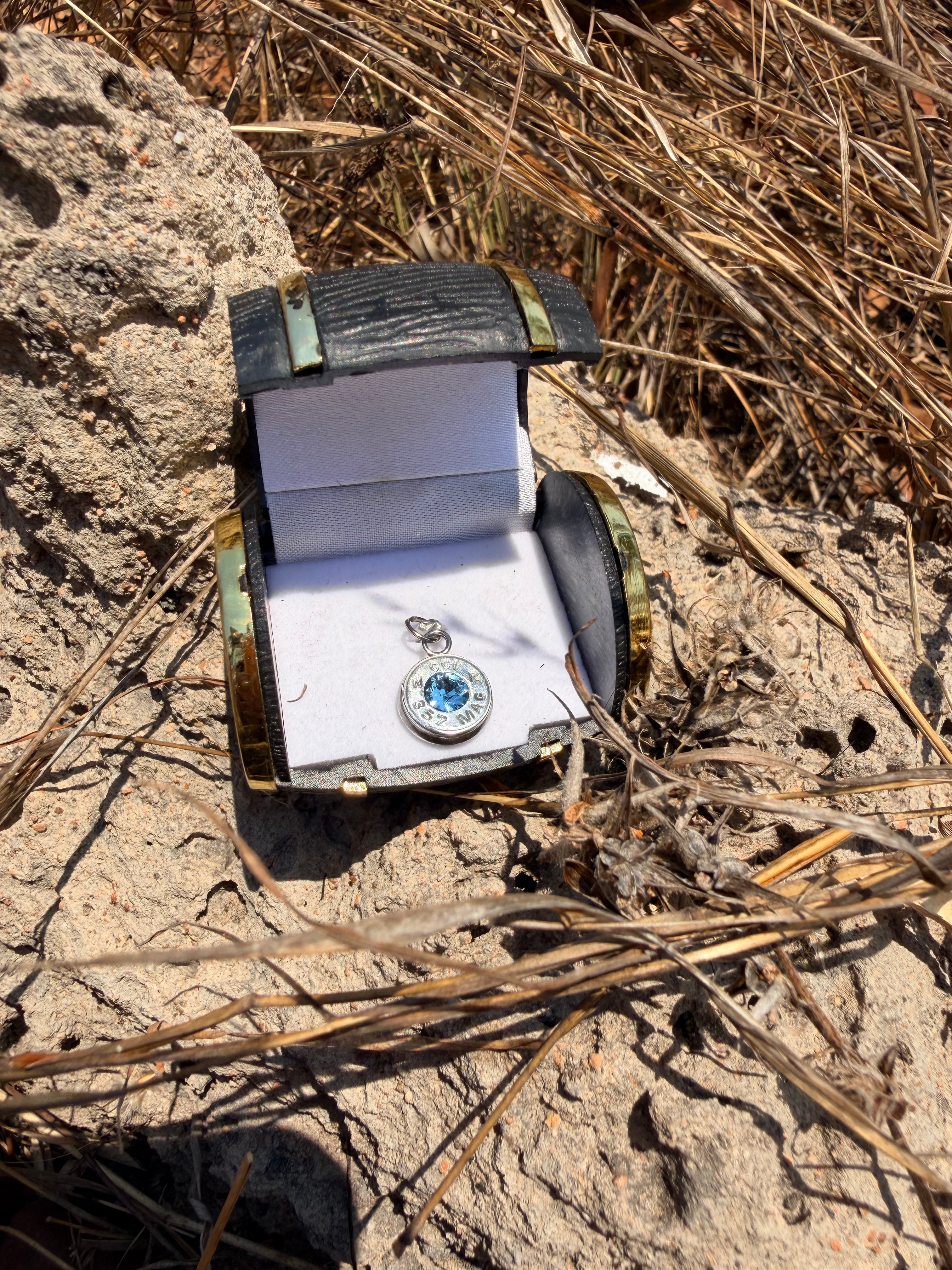 Nickel light sapphire Pendent - 375-inch caliber